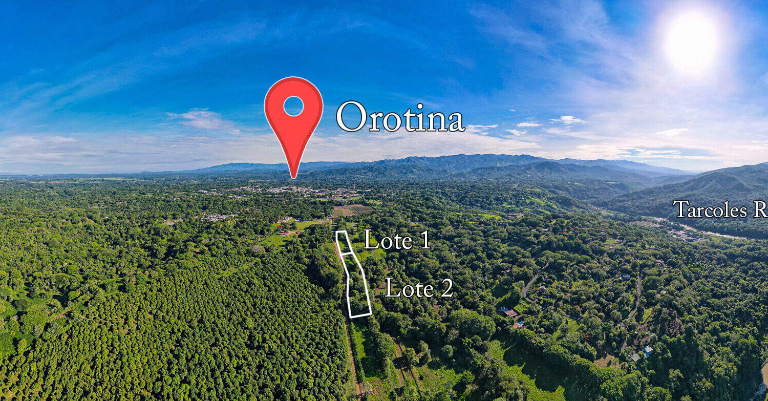 Aerial view of both adjoining lots with Orotina and the Tárcoles River beyond