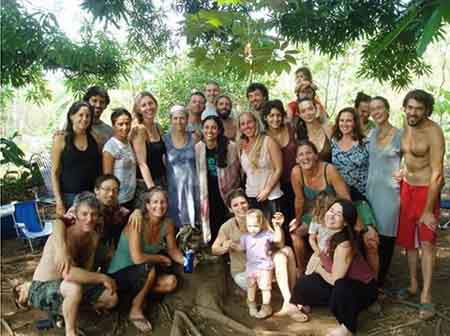 A large group of community members gathered outdoors for a portrait